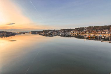 view of the river in a city at sunset 