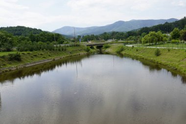 beautiful landscape with a river and a mountains 
