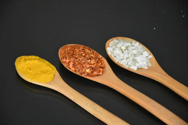 Various Spices Wooden Spoons Black Background — Photo