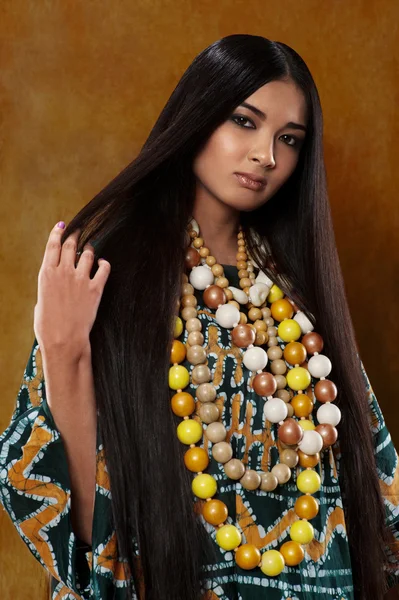 Woman in ethnic dress — Stock Photo, Image