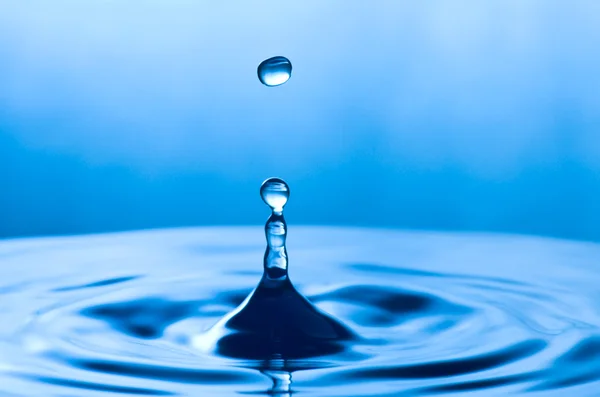 Water drops and wave — Stock Photo, Image