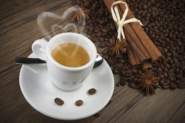 Coffee cup with heart of steam — Stock Photo, Image