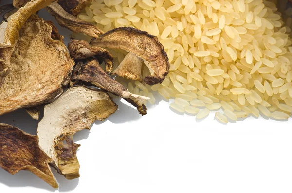 Arroz e cogumelos porcini secos — Fotografia de Stock