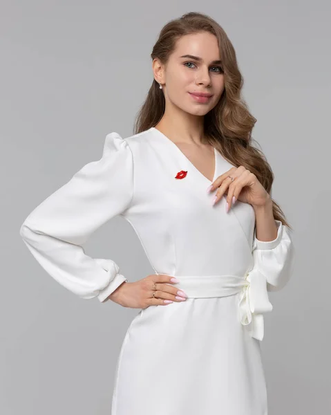 Confident and professional woman doctor in white uniform with medical stethoscope stand on copy space background, crossed hands on chest. Concept of business portrait for clinic or hospital website