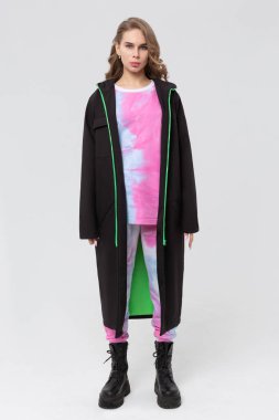 Beautiful girl in a raincoat. Front view. Raincoat template mock-up