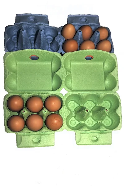 Eggs in green and blue packaging — Stock Photo, Image