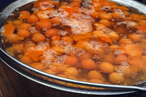 Broken eggs in a large bowl — Stock Photo, Image