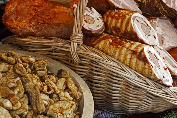 Cracklings and sausage — Stock Photo, Image