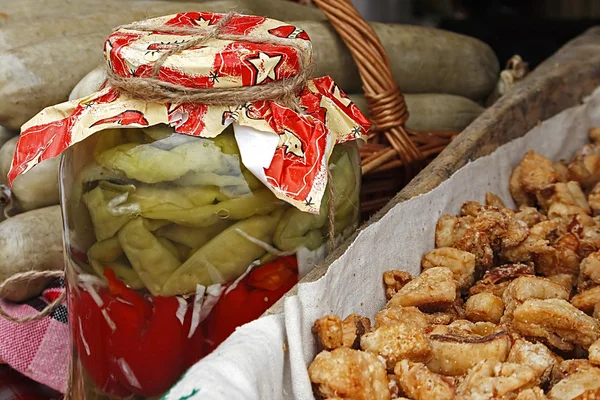 Cracklings, pickles and sausage 1 — Stock Photo, Image