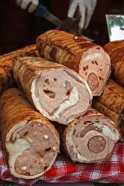 Traditional sausages, cut to be served — Stock Photo, Image