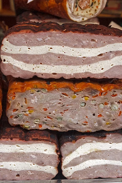 Traditional sausages specialty overlapping — Stock Photo, Image