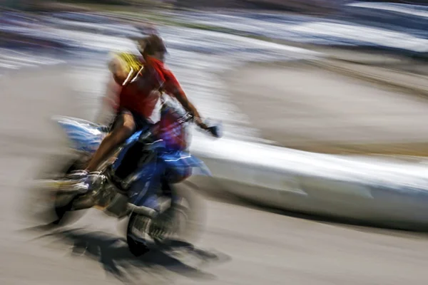 Abstract blurred motion motorcyclist 3