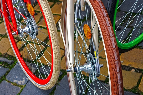 Multicolored bicycle wheels — Stock Photo, Image