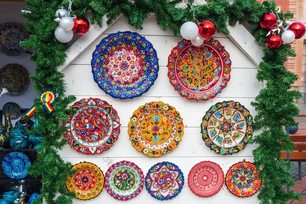 Winter Decorations Painted Plates Pine Branches Placed Rustic Wood Wall — 图库照片