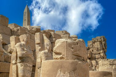 Aspects from the Karnak Temple complex, a mix of ancient egyptian temples and pylons near Luxor, Egypt. Construction began around 2000-1700 BCE up to 30530 BCE. God is Amun-Ra. World Heritage Site.