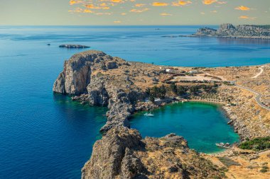 View of the Saint Paul's Bay from the height of the Acropolis of Lindos. One of the most beautiful beaches in Greece, located on the SE side of Rhodes islands, next to the old village of Lindos.