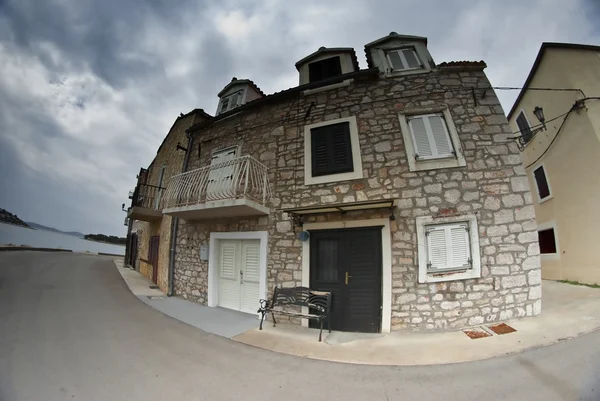 Old street of stone houses, bad weather — Stock Photo, Image