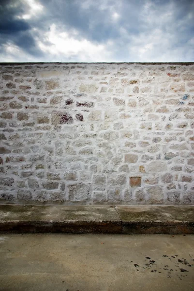 ストリートと石造りの壁テクスチャ背景 — ストック写真
