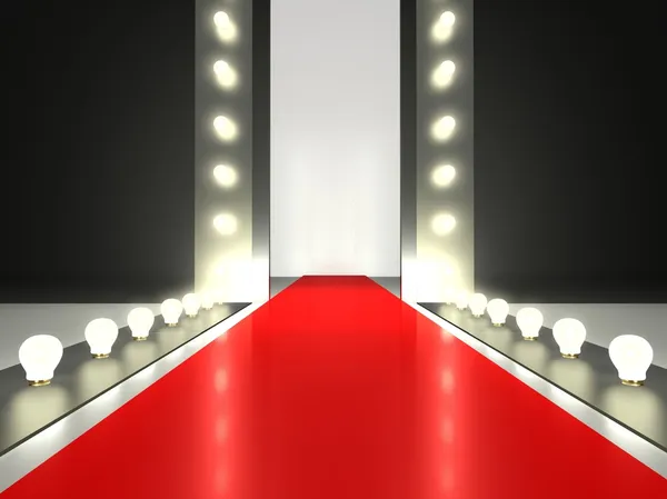 Empty red carpet, fashion runway illuminated — Stock Photo, Image