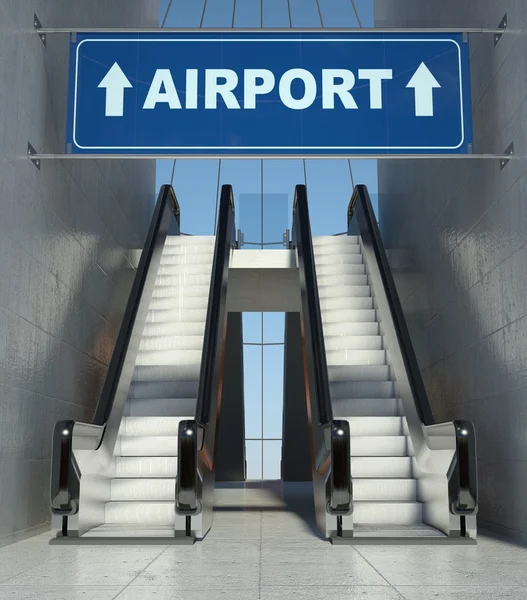 Escaleras mecánicas en movimiento en el edificio, señal del aeropuerto — Foto de Stock