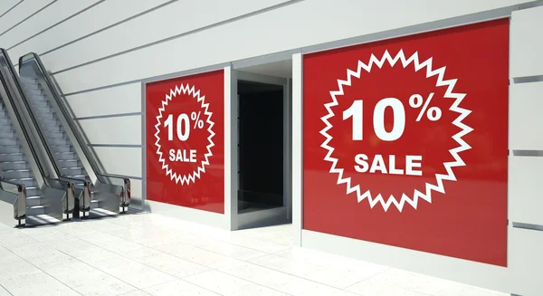 10 percent sale on shopfront windows and escalator — Stock Photo, Image