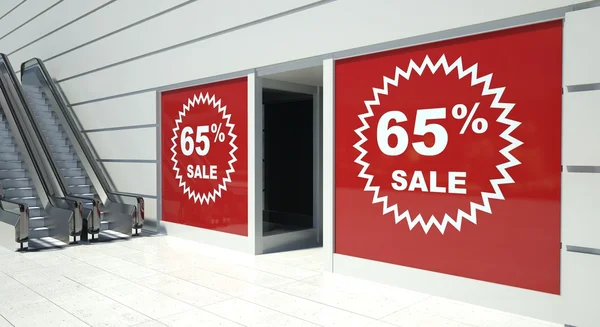 65 percent sale on shopfront windows and escalator — Stock Photo, Image