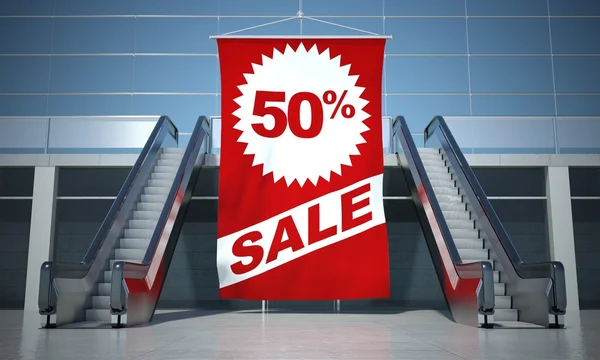 50 percent sale advertising flag and escalator — Stock Photo, Image