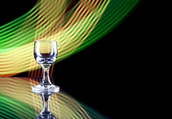 Verre d'alcool sur fond disco, fête — Photo