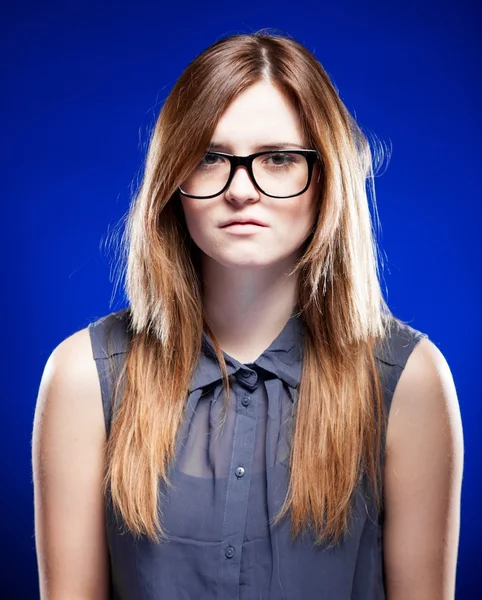 Strict serious young woman with nerd glasses — Stock Photo, Image