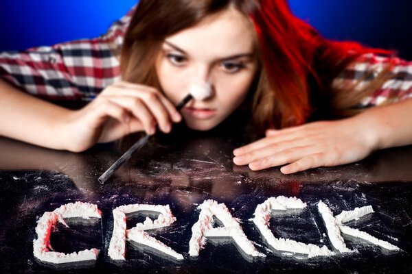 Woman snorting cocaine or amphetamines, crack addiction