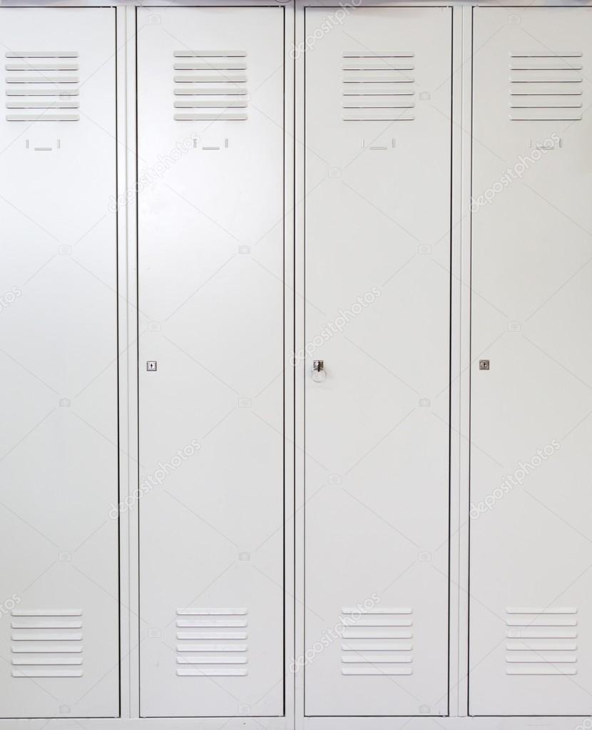 Empty white school metal lockers