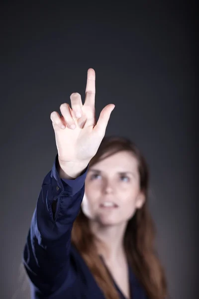 Το χέρι της γυναίκας, ένα δάχτυλο δείχνοντας κάτι — Φωτογραφία Αρχείου