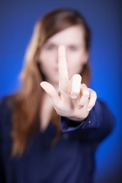 Vrouw hand, één vinger wijzen iets — Stockfoto