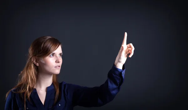 Frauenhand, ein Finger zeigt auf etwas — Stockfoto