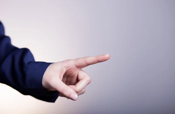 Woman's hand with finger, bright background — Stock Photo, Image