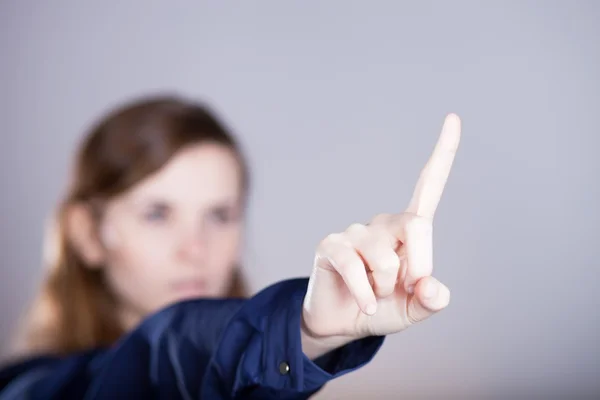 Woman's hand with finger, dark background — Stock Photo, Image