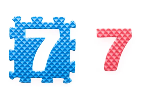 Quebra-cabeças coloridos com número 7 para crianças — Fotografia de Stock
