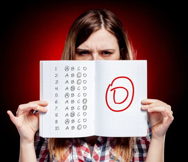 School grade of exam and disappointed girl — Stock Photo, Image