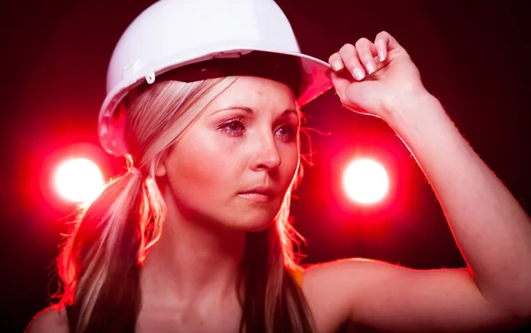 Young architect woman construction worker, glowing lights — Stock Photo, Image