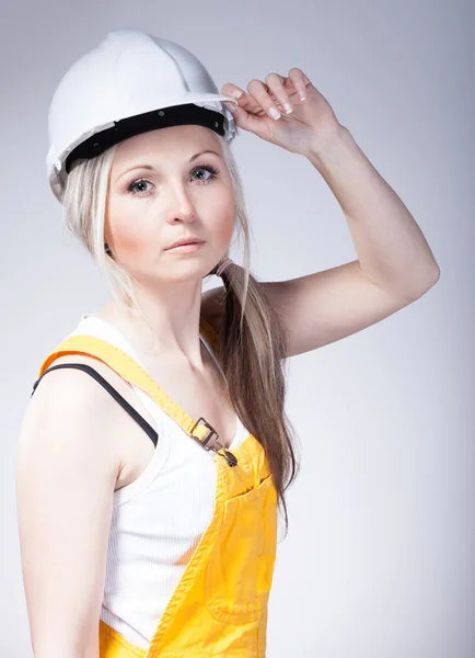 Young builder woman, construction worker — 스톡 사진