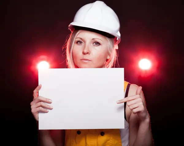 Young architect woman construction worker, empty poster — Stockfoto