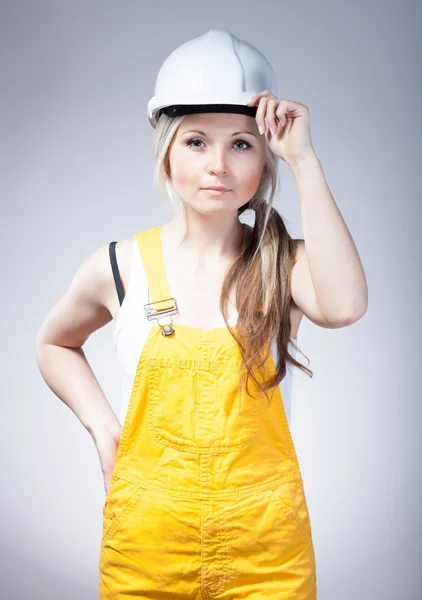 年轻的生成器的女人，建筑工人 — 图库照片