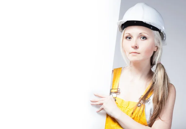 Jonge bouwer vrouw bouwvakker, leeg frame — Stockfoto