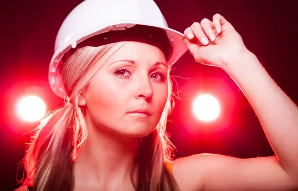 Young architect woman construction worker, glowing lights — 스톡 사진