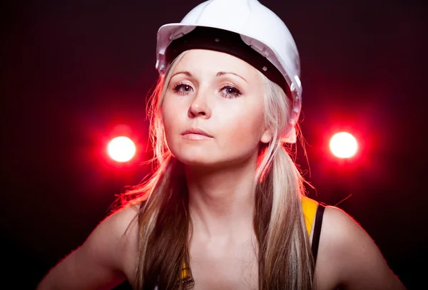 Young architect woman construction worker, glowing lights — Stock Photo, Image