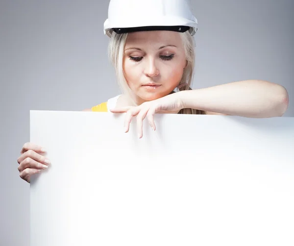 Young builder craftswoman construction worker, empty frame — Stock Photo, Image