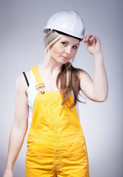 Young builder craftswoman, construction worker — Stock Photo, Image