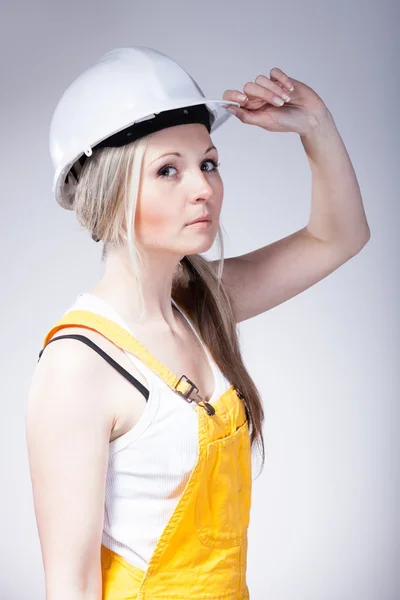 Young woman as a construction worker — Stock Photo, Image