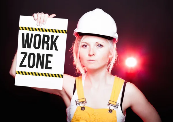 Work zone sign placed on information board, worker woman — Stock Photo, Image