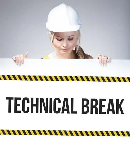 Caution sign held by worker — Stock Photo, Image